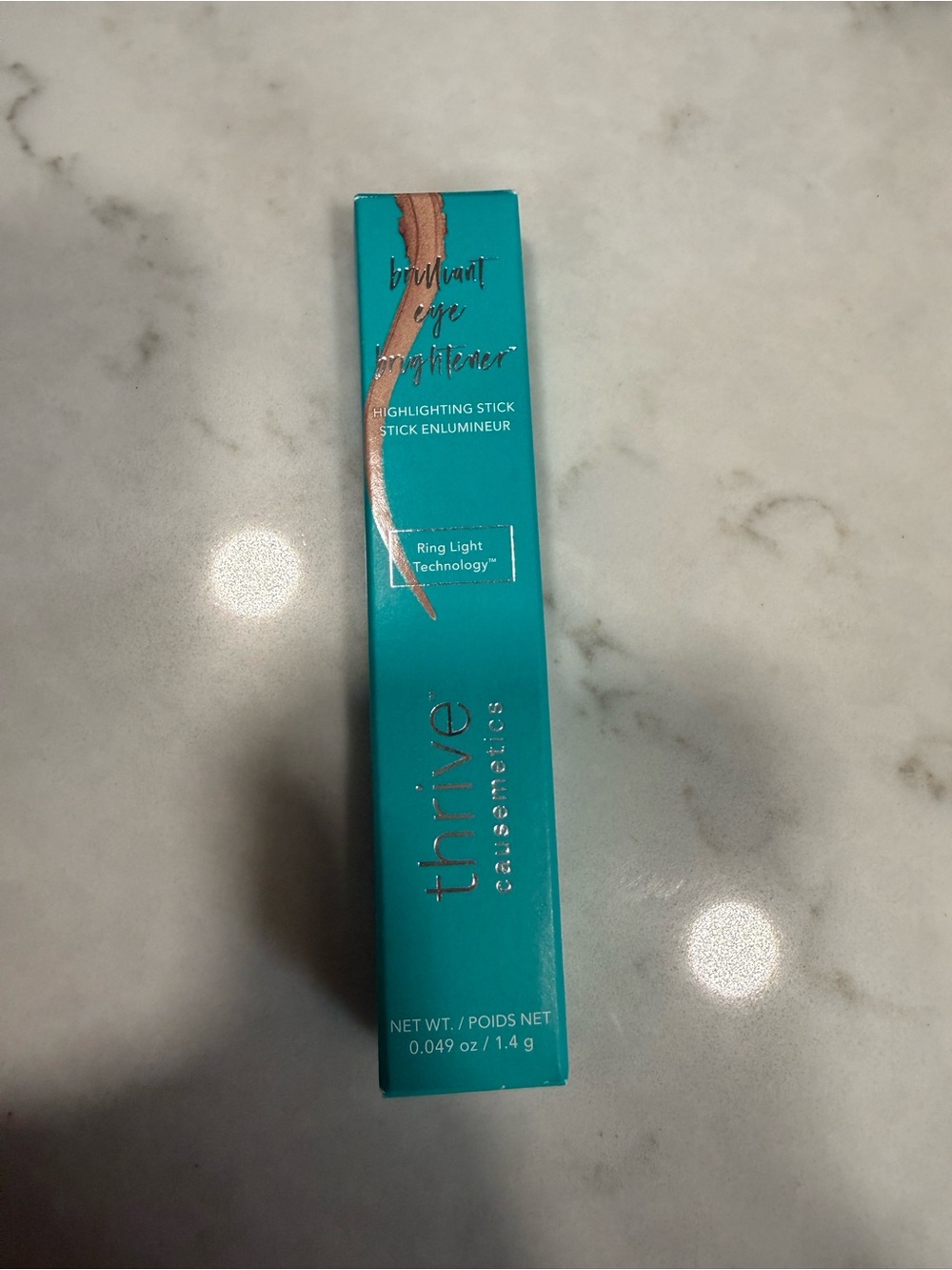 Thrive Highlighting Stick in Teal with Rose-Gold Accent